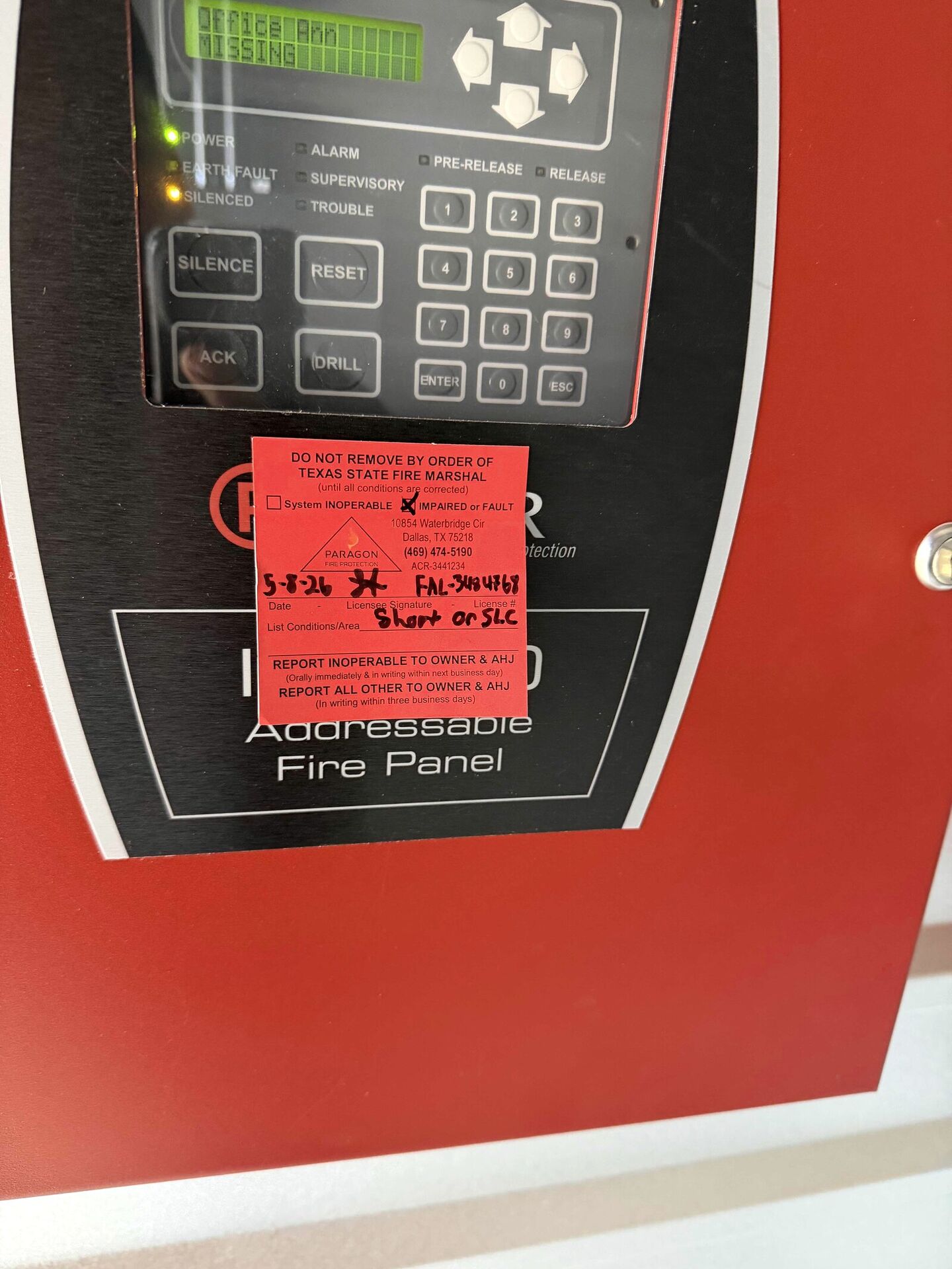 Before: Fire alarm panel — lightning-damaged, red-tagged, property in firewatch → new panel permitted, programmed, and walked by the AHJ; property out of firewatch.