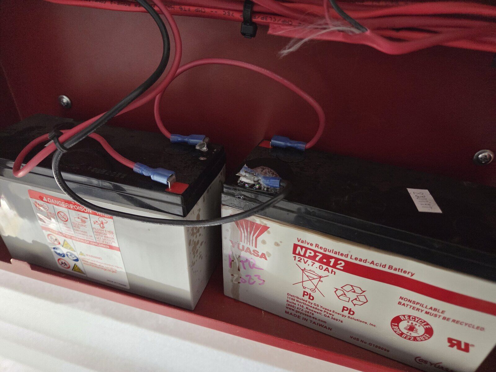 Lightning surge fried the panel's standby batteries — direct damage from the strike