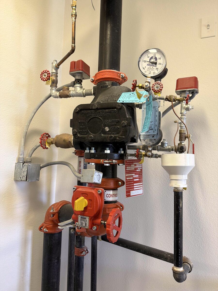 Floor control assembly with a replaced pressure gauge