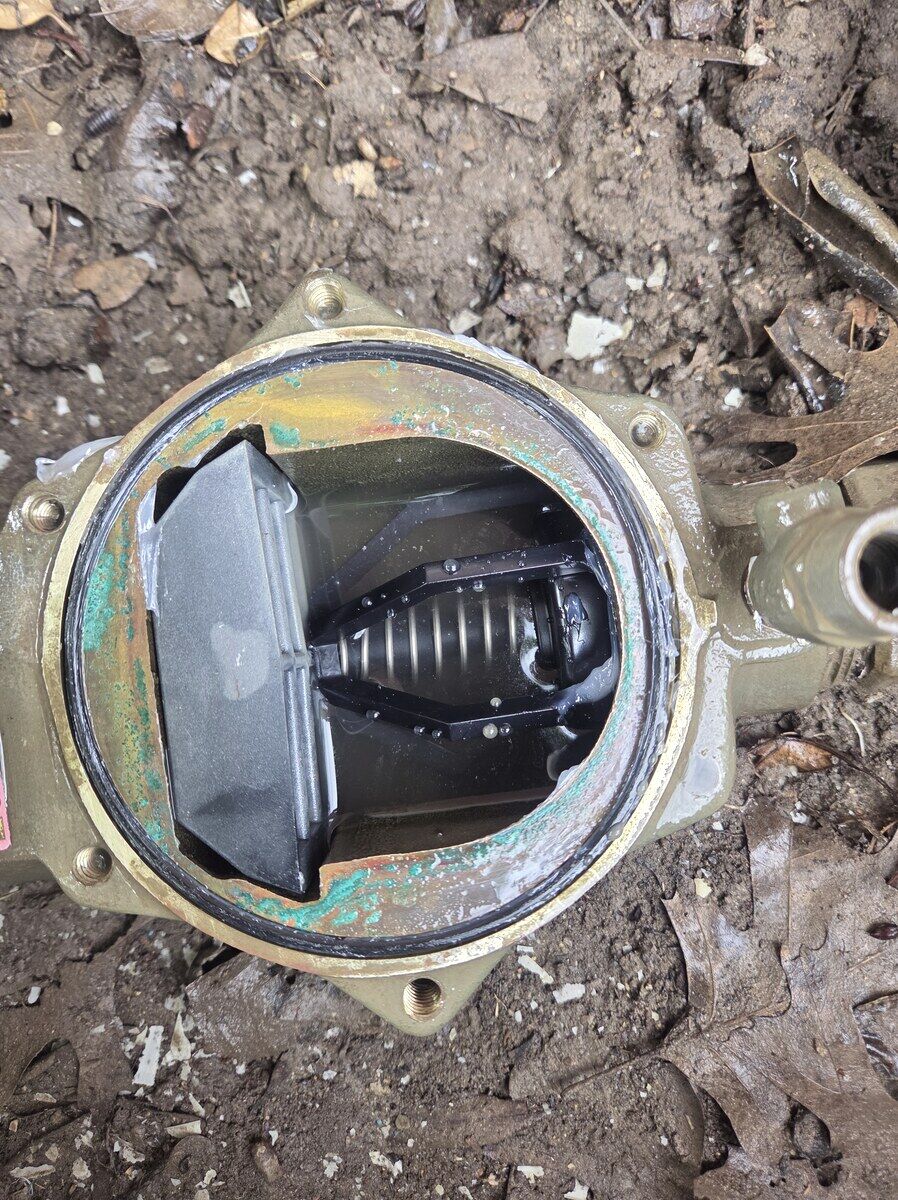 After: Backflow assembly — failed differential at annual test → rebuilt internals, passing retest with a TCEQ-compliant report on file.