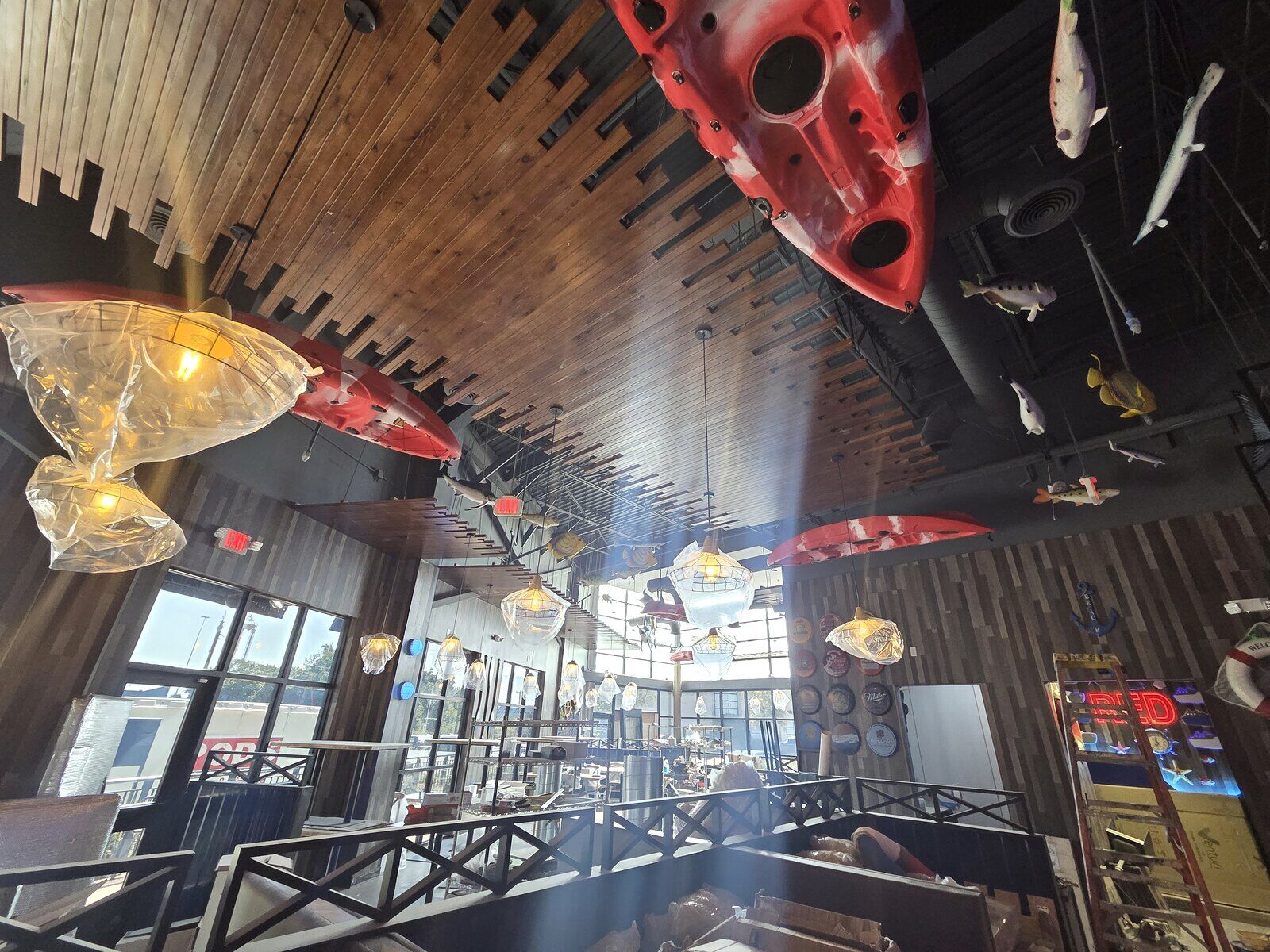 Before: Restaurant ceiling — decorative floating ceiling, no sprinkler heads (couldn't open) → fully sprinklered, fire marshal signed off, Red Crab opened.
