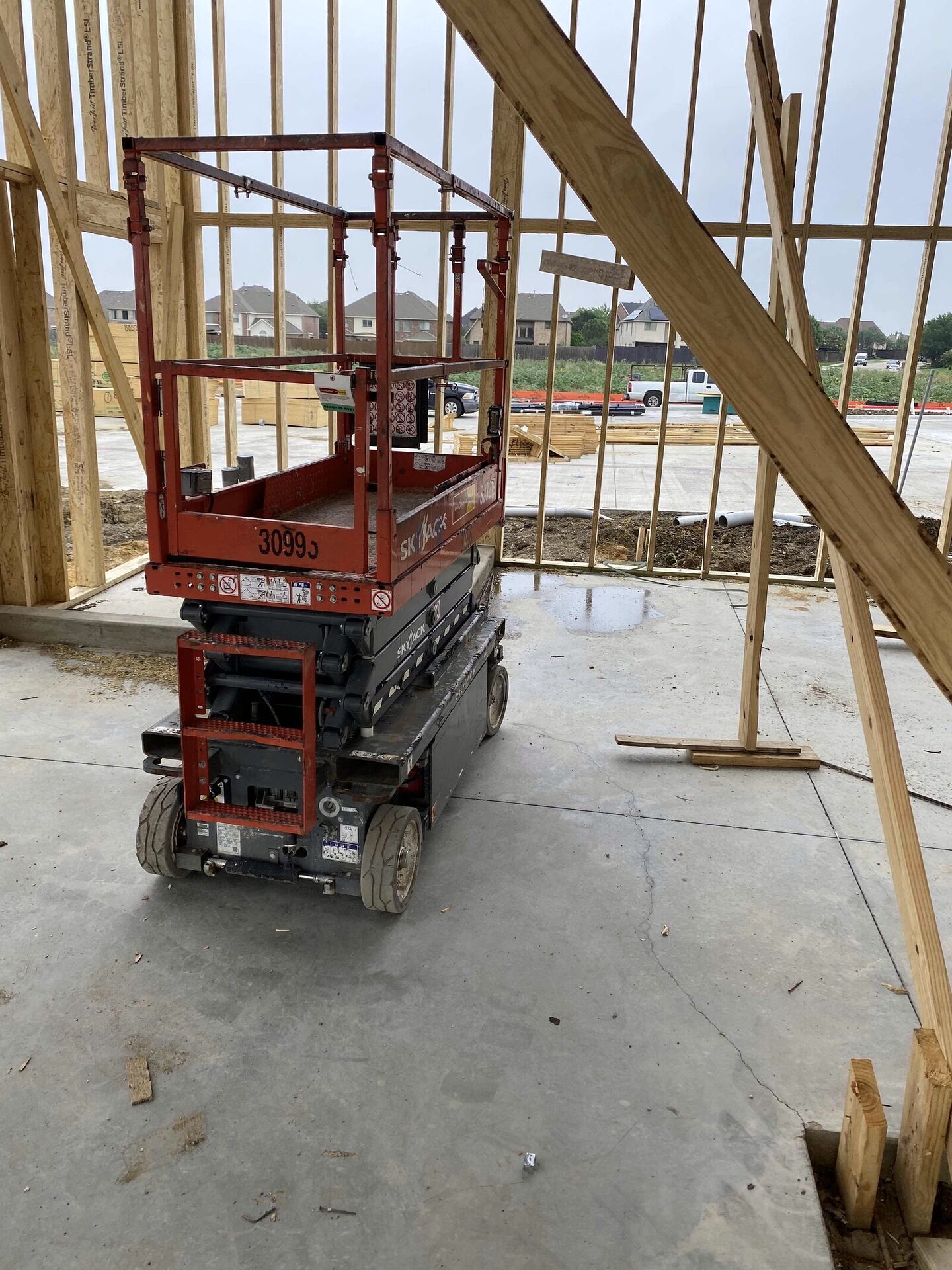 Lifts on site, crew ready to hang pipe